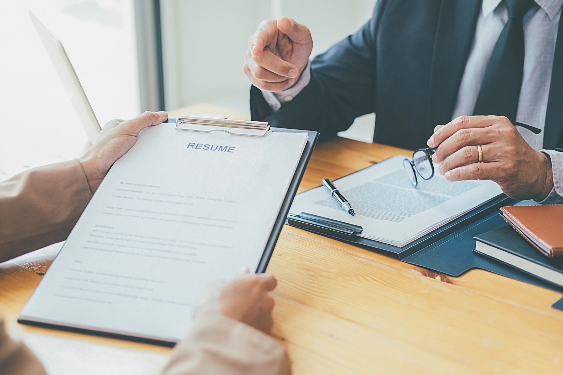 Attractive young business woman in a job interview with a corporate personnel manager